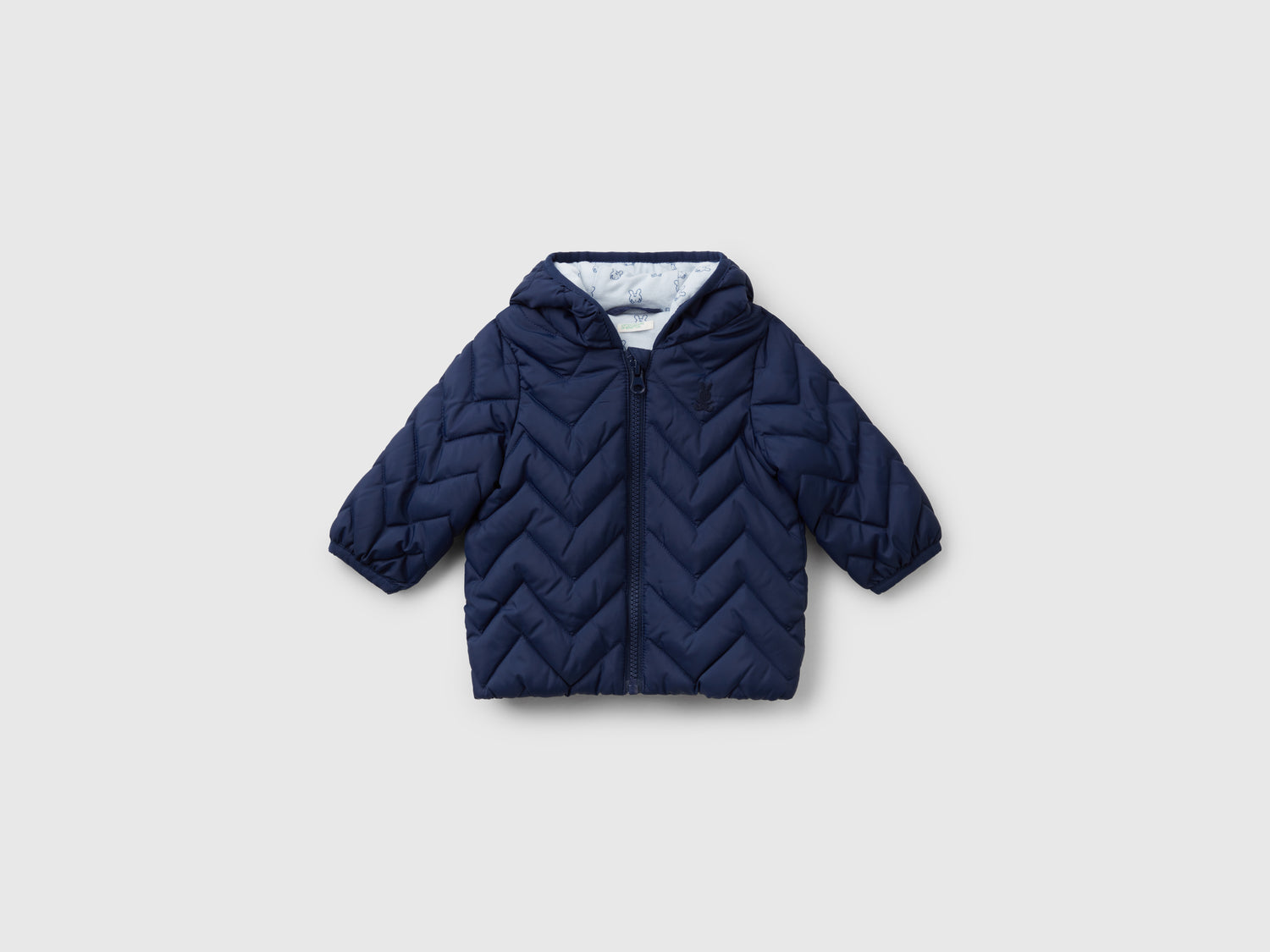 Piumino imbottito con orecchie da neonato blu scuro | Benetton Outlet