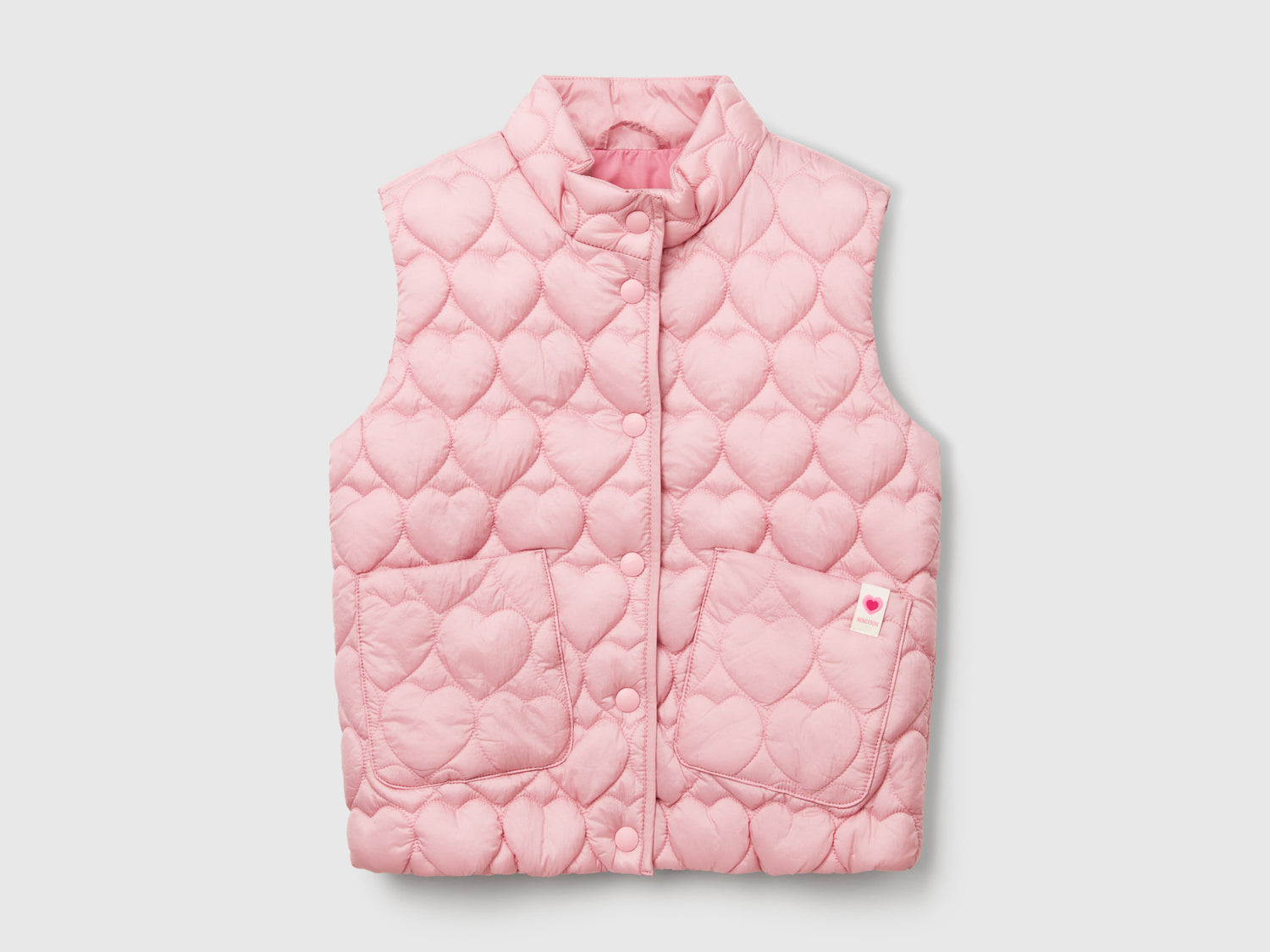 Gilet imbottito con trapuntatura a cuori da bimba rosa | Benetton Outlet