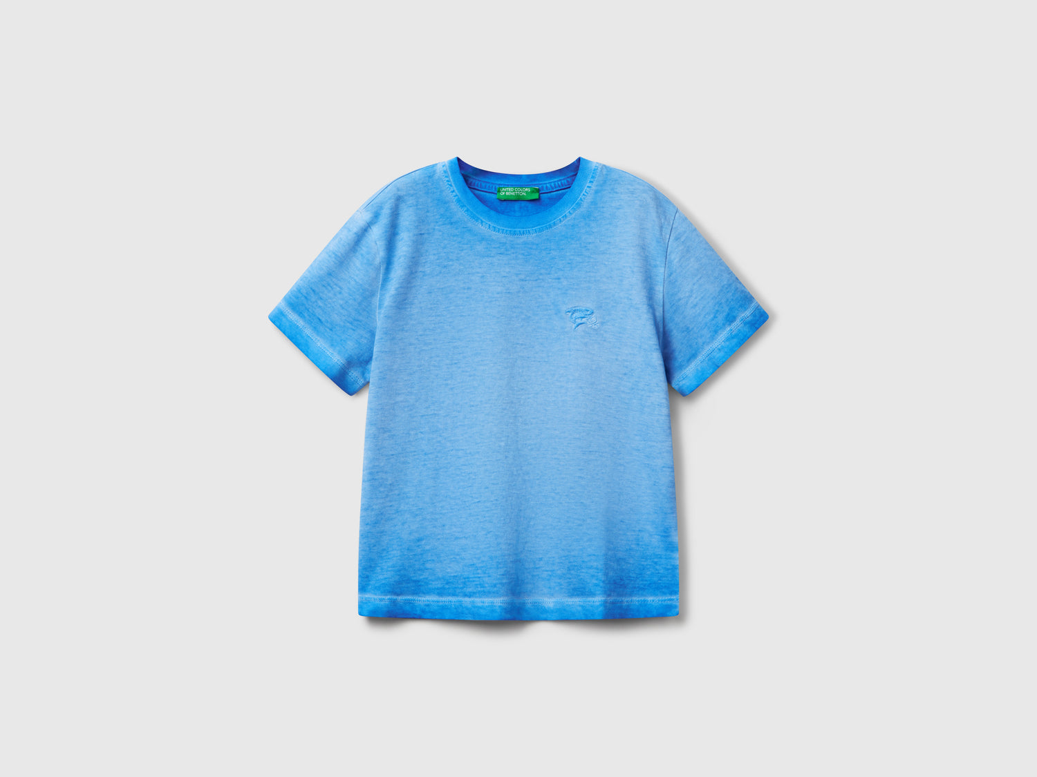 Maglietta over fit con ricamo da bimbo blu | Benetton Outlet