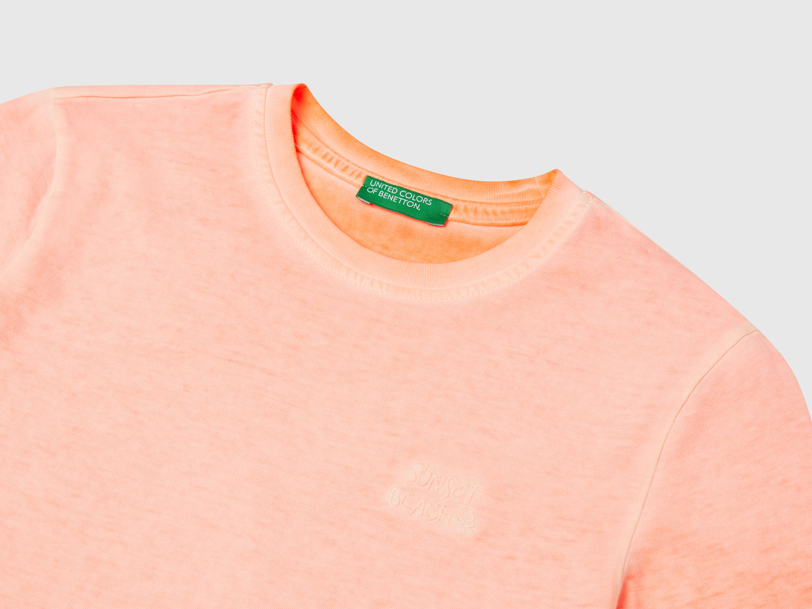 Maglietta over fit con ricamo da bimbo arancione fluo 3 | Benetton Outlet