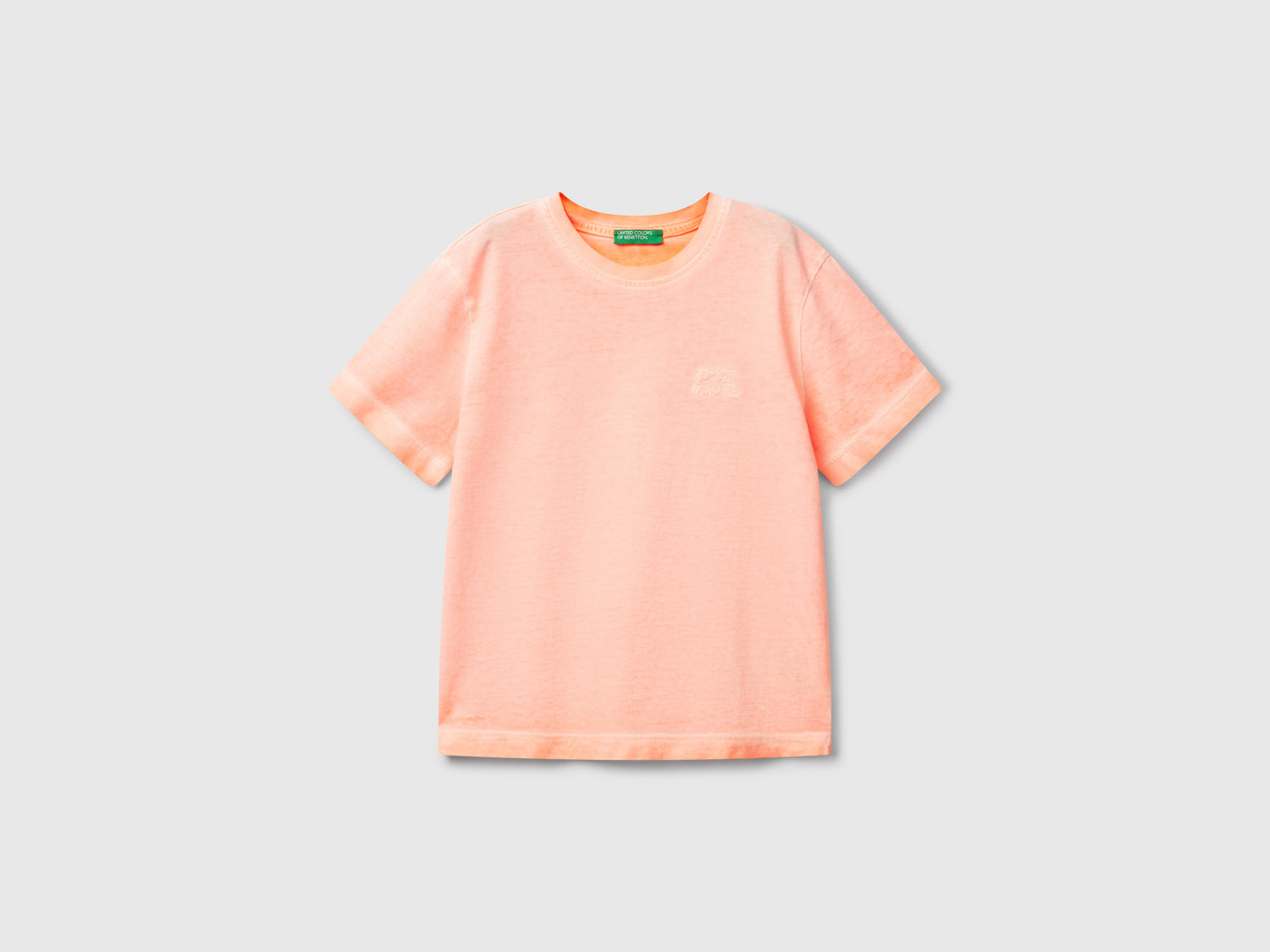 Maglietta over fit con ricamo da bimbo arancione fluo | Benetton Outlet