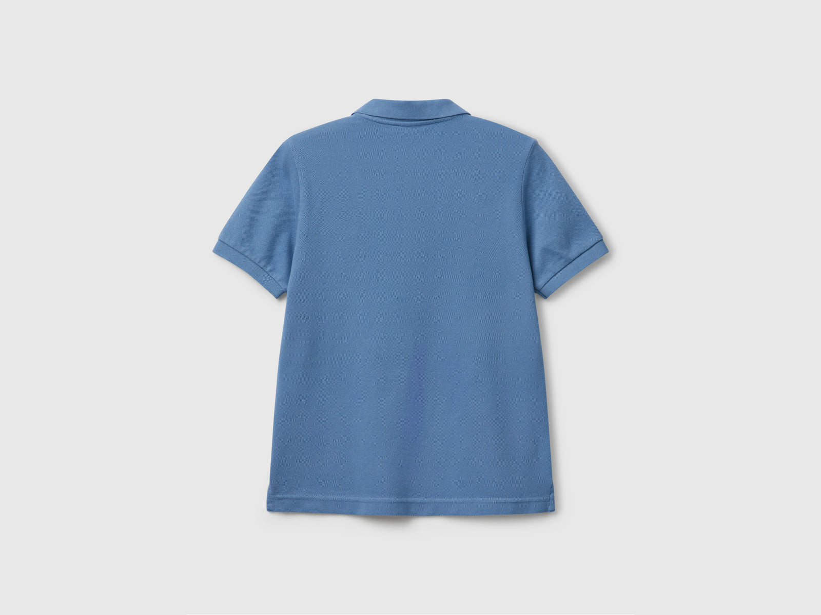 Polo slim fit in puro cotone da bambino azzurro 2 | Benetton Outlet