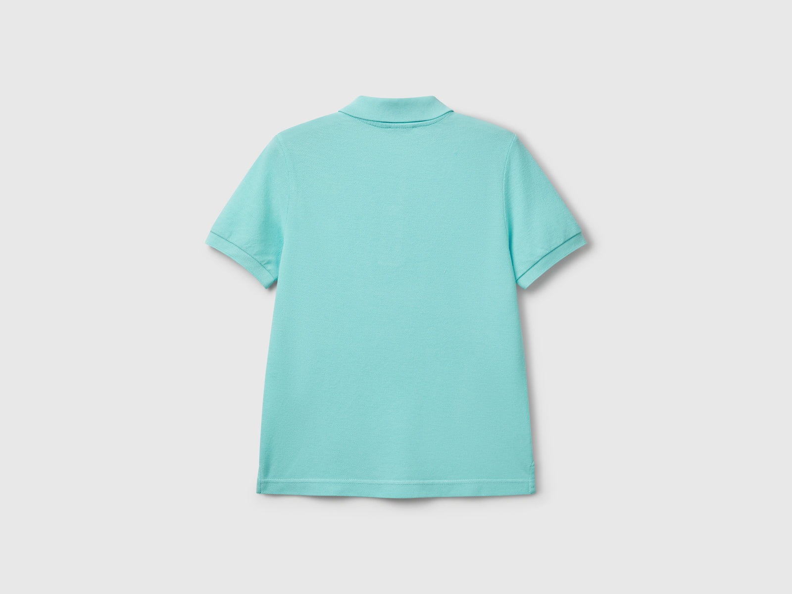Polo slim fit in puro cotone da bambino turchese 2 | Benetton Outlet