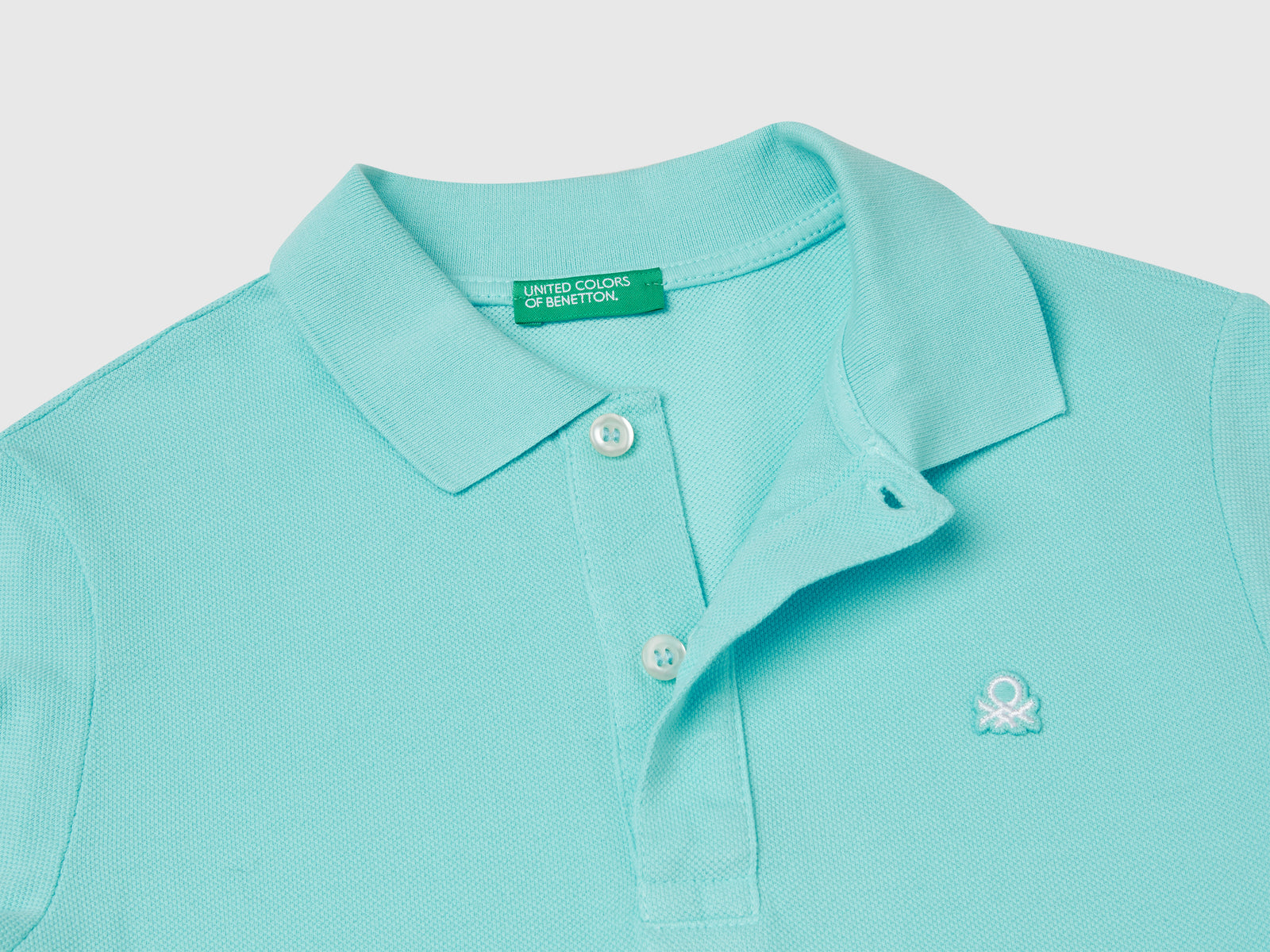 Polo slim fit in puro cotone da bambino turchese 3 | Benetton Outlet