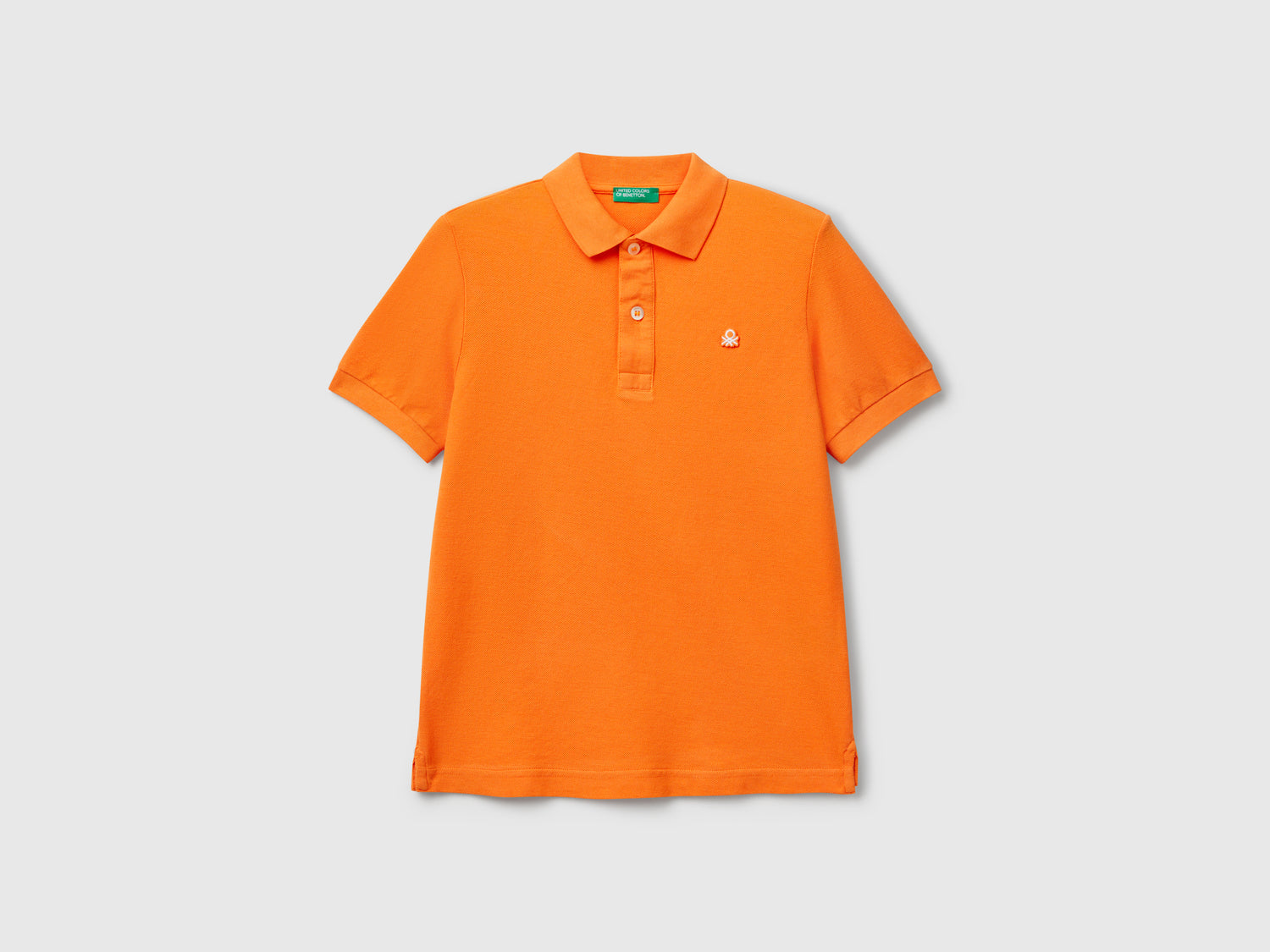 Polo slim fit in puro cotone da bambino arancione | Benetton Outlet