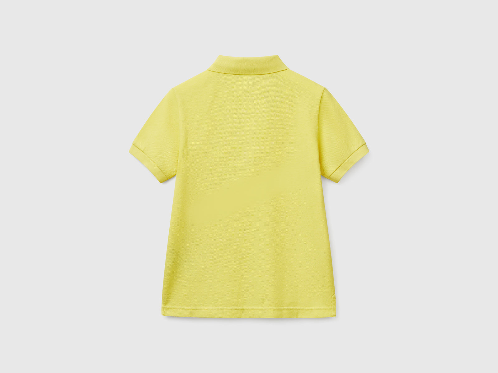 Polo slim fit in puro cotone da bambino lime 2 | Benetton Outlet