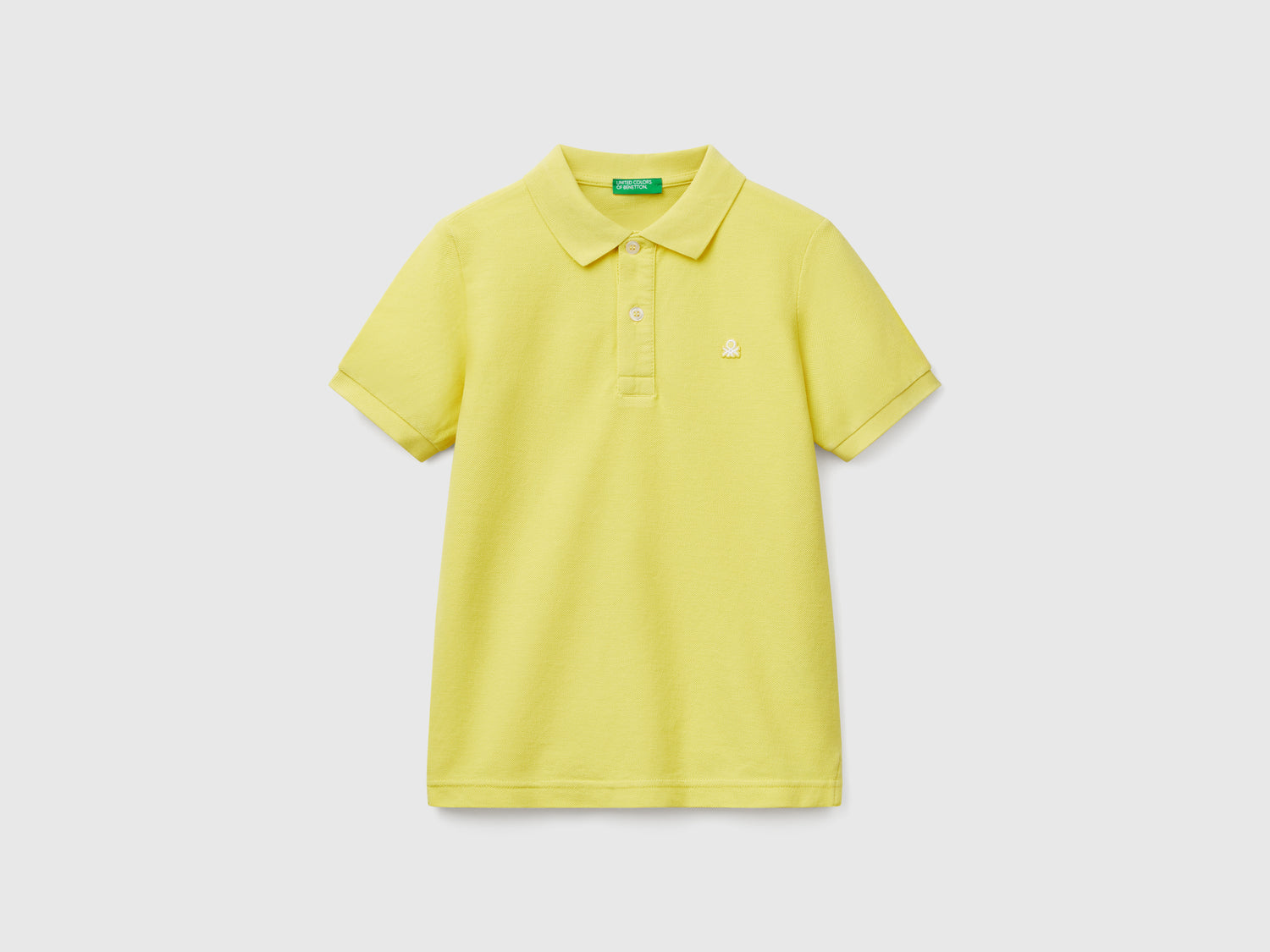 Polo slim fit in puro cotone da bambino lime | Benetton Outlet