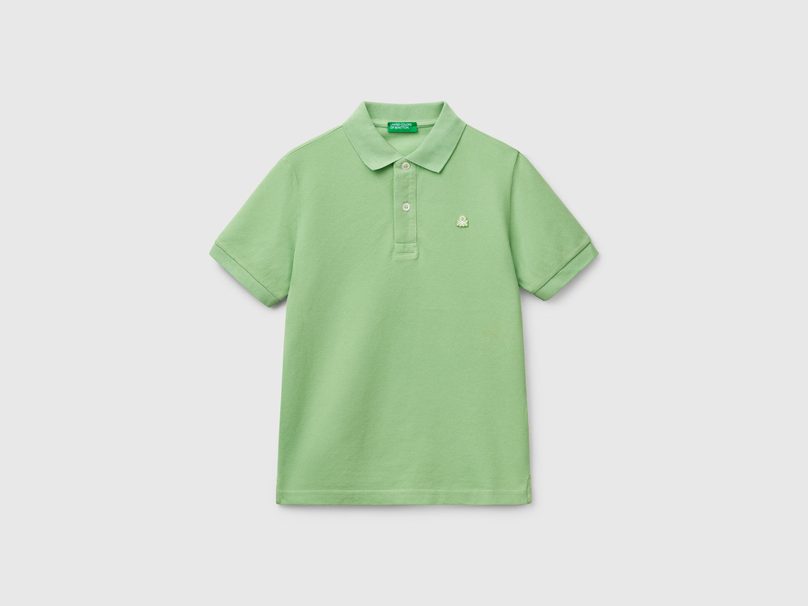 Polo slim fit in puro cotone da bambino verde | Benetton Outlet