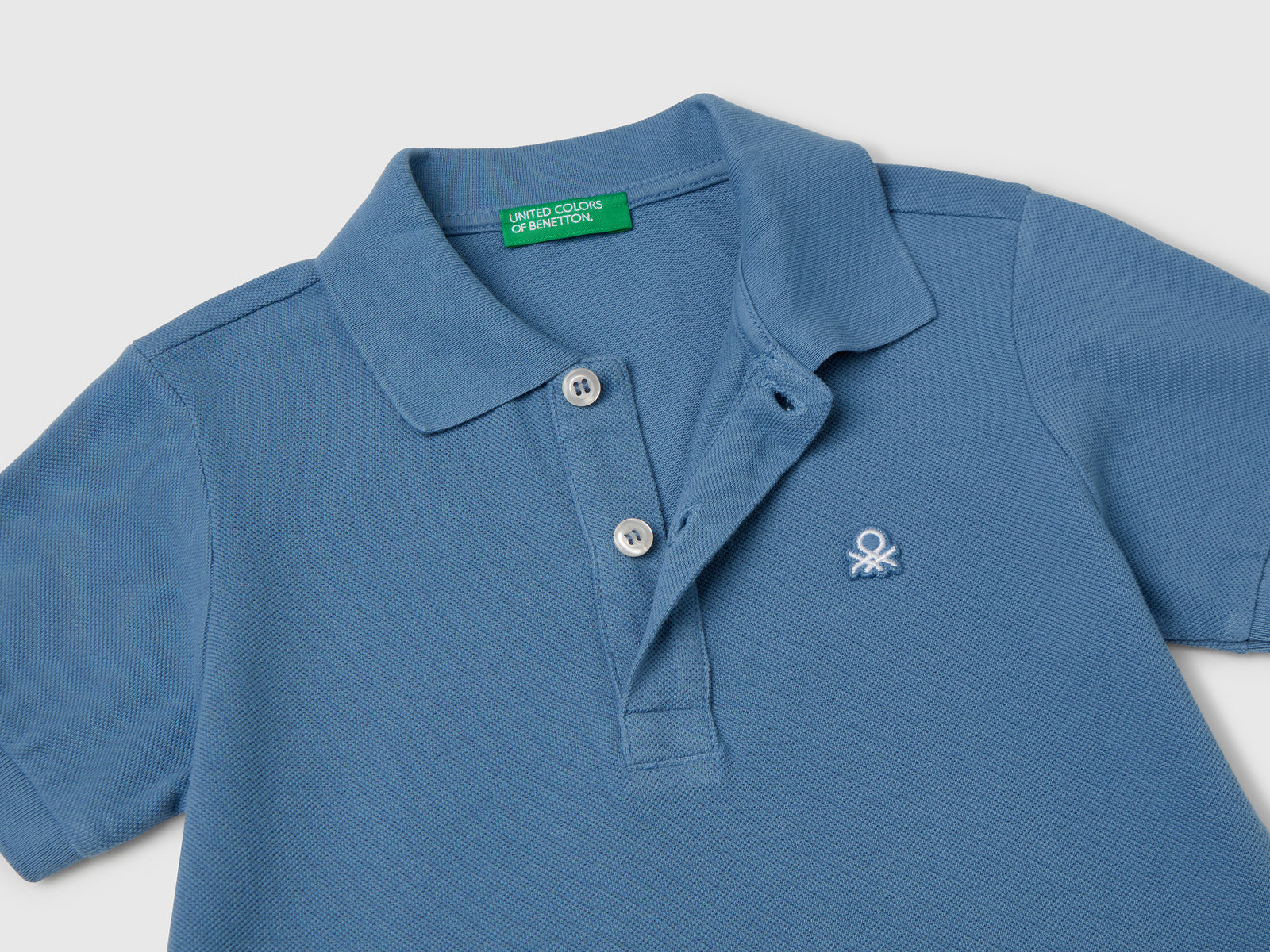 Polo manica corta in puro cotone da bimbo azzurro 3 | Benetton Outlet