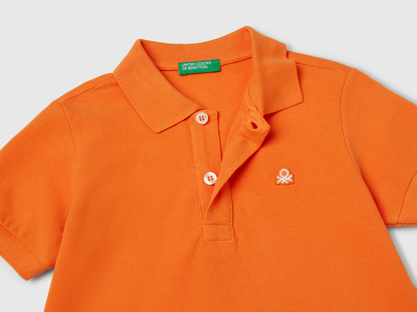 Polo manica corta in puro cotone da bimbo arancione 3 | Benetton Outlet
