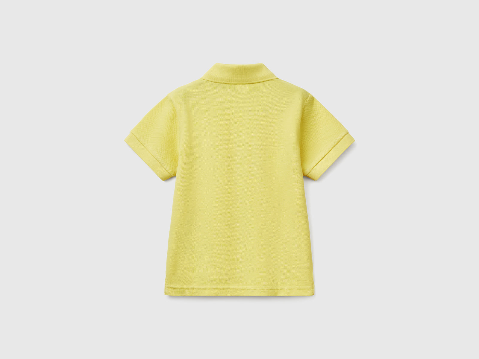 Polo manica corta in puro cotone da bimbo lime 2 | Benetton Outlet