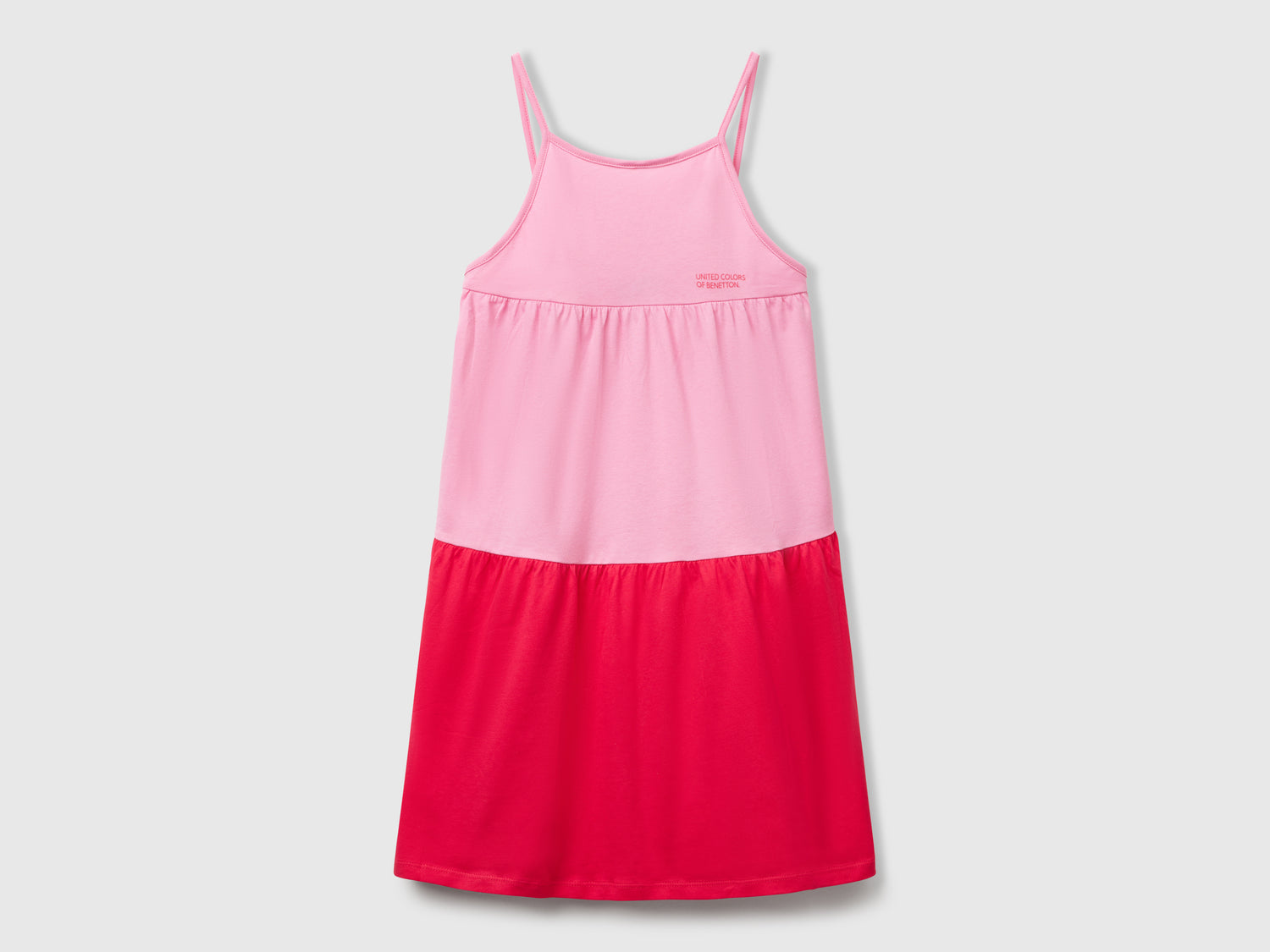 Abito ampio con balza da bambina rosa | Benetton Outlet