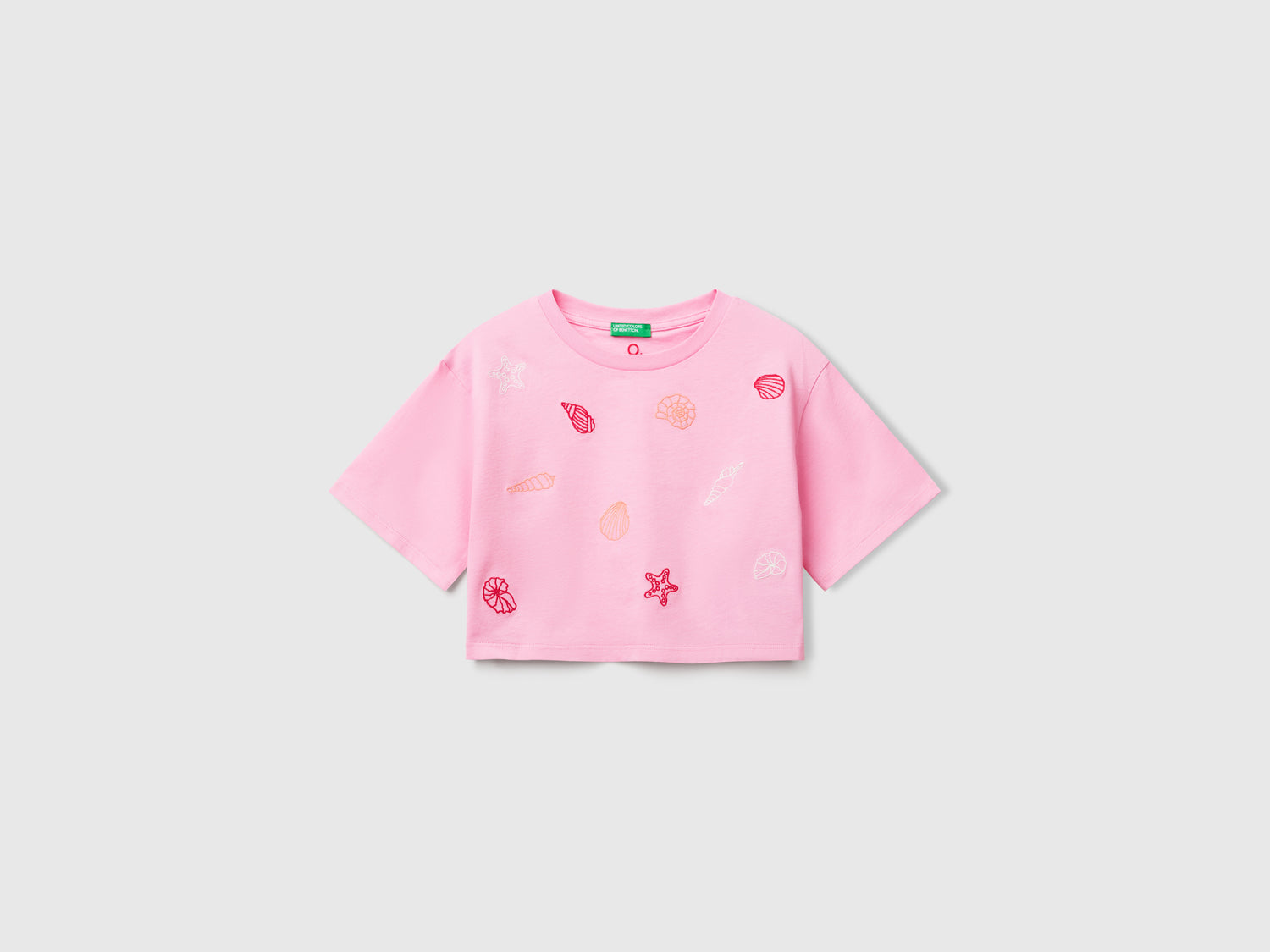 T-shirt con ricamo conchiglie da bambina rosa | Benetton Outlet