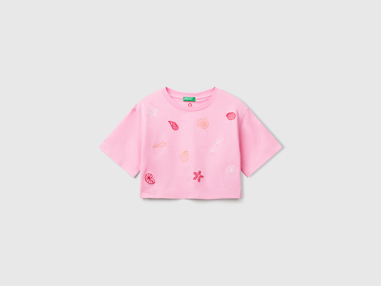 T-shirt con ricamo conchiglie da bambina rosa | Benetton Outlet