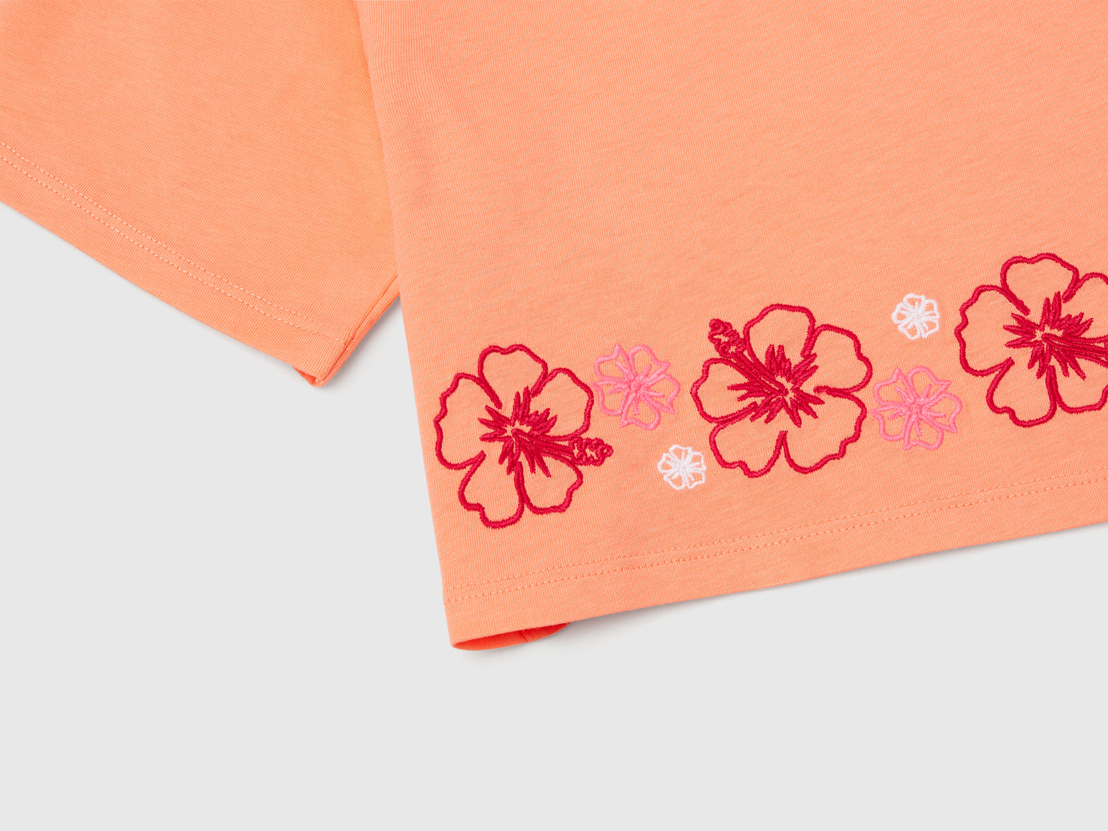 T-shirt con ricamo fiori da bambina arancione 3 | Benetton Outlet