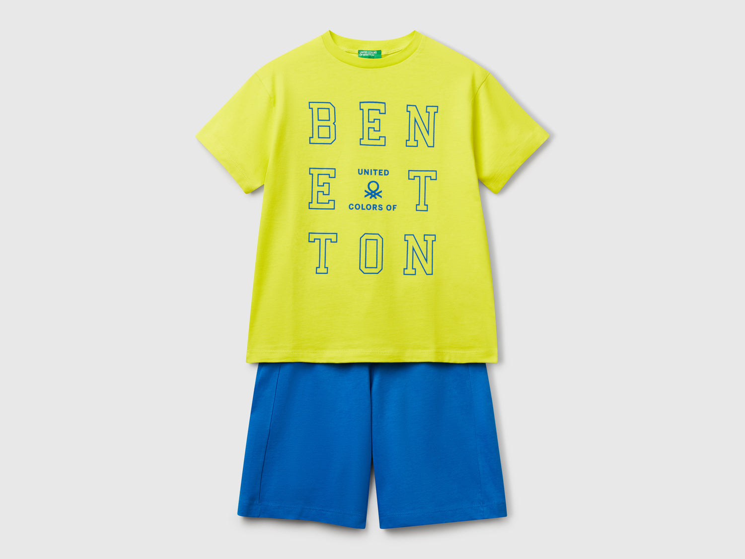 Completo t-shirt e bermuda da bambino giallo fluo | Benetton Outlet