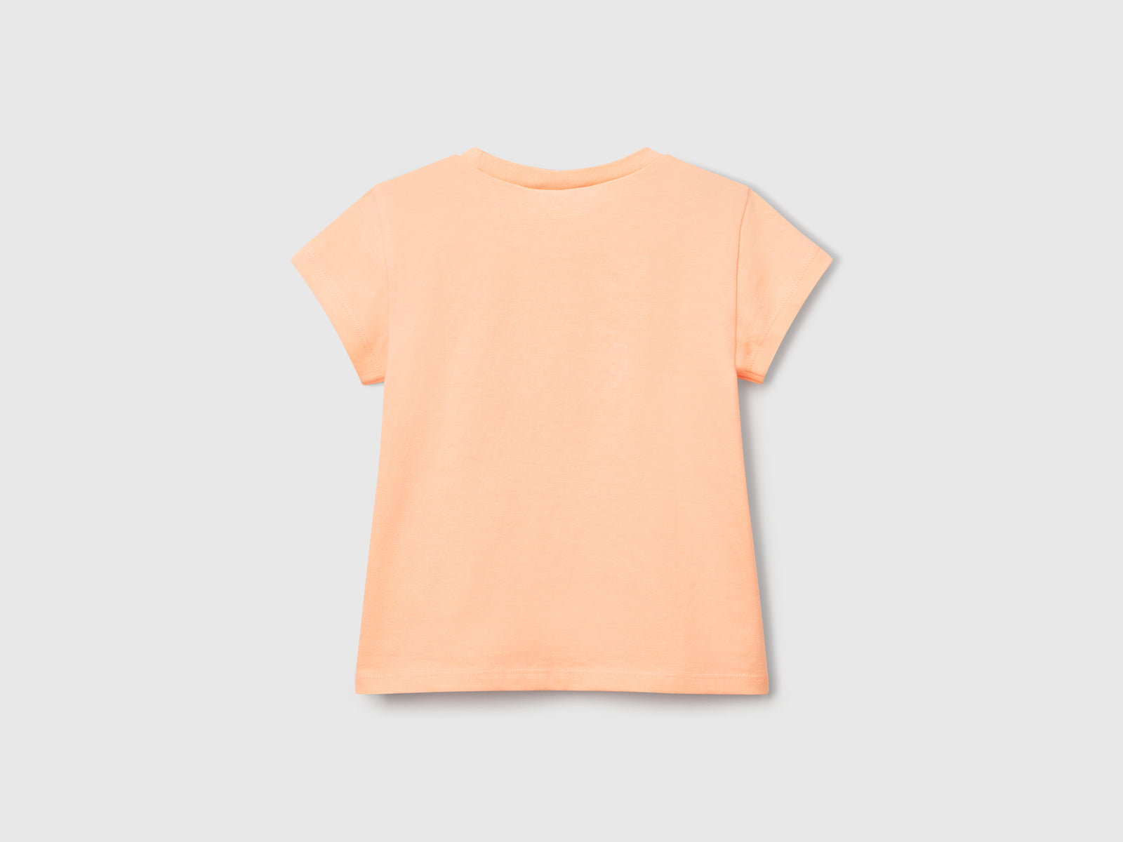 Maglietta con stampa e applicazione da bimba pesca 2 | Benetton Outlet