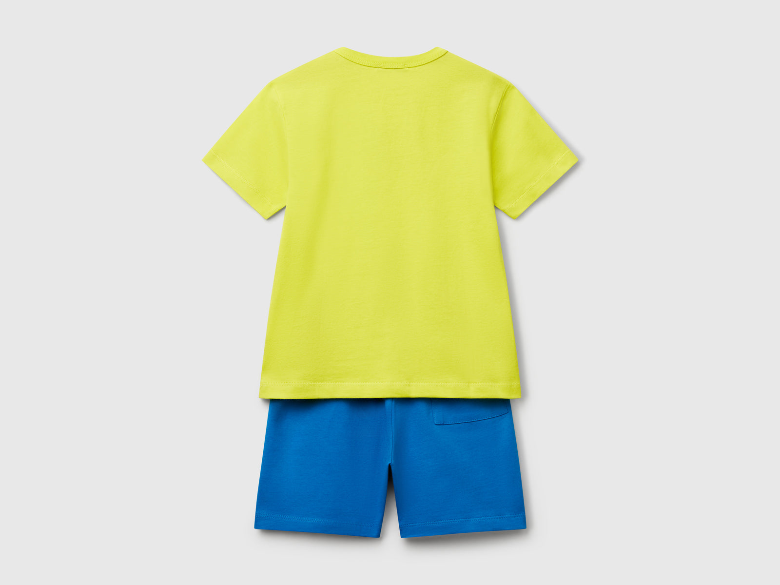 Completo t-shirt e bermuda 100% cotone da bimbo giallo fluo 2 | Benetton Outlet
