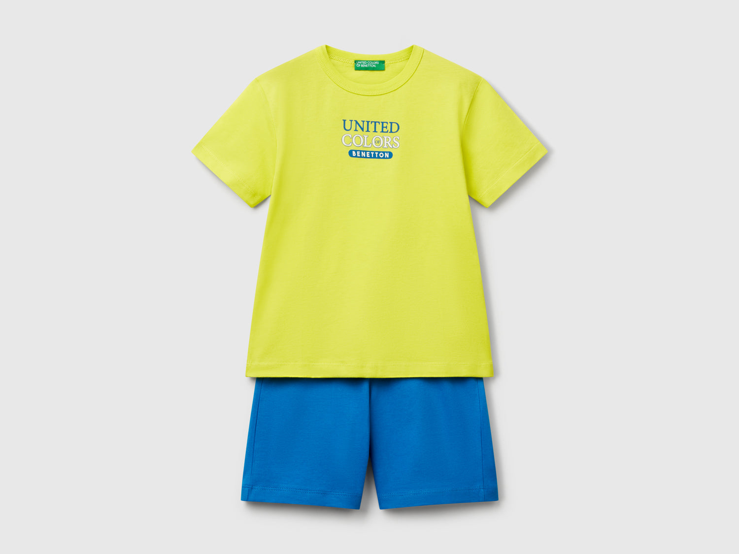 Completo t-shirt e bermuda 100% cotone da bimbo giallo fluo | Benetton Outlet