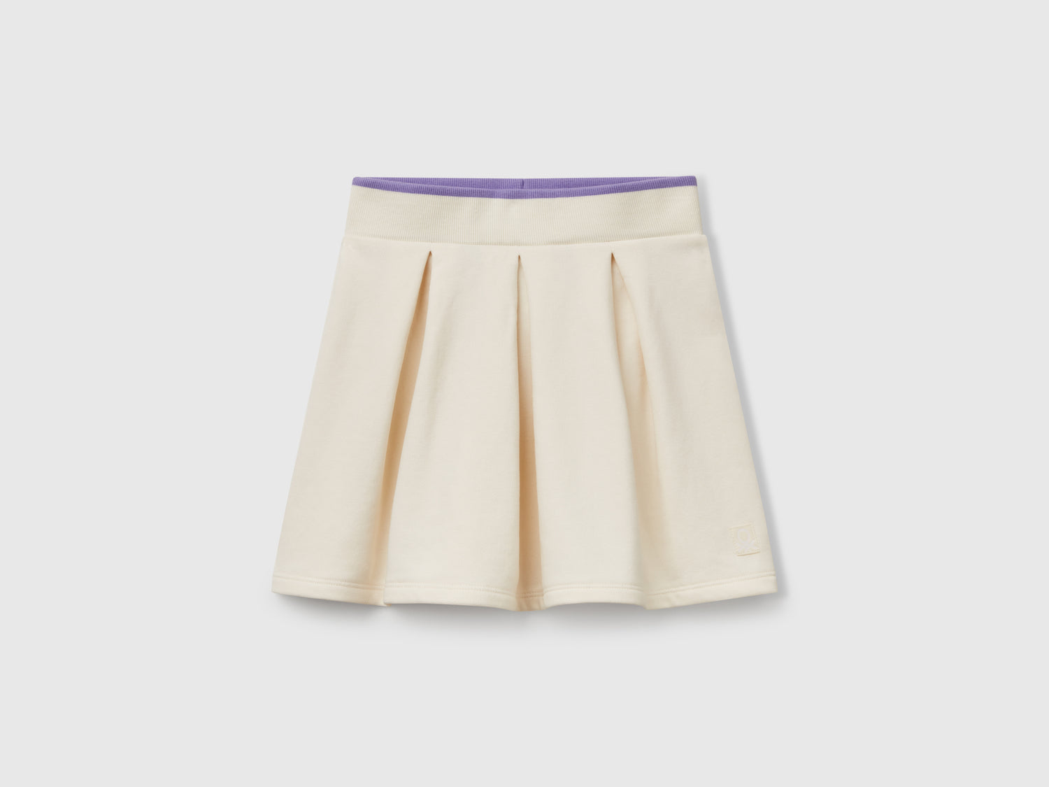 Gonna in felpa con pieghe da bambina bianco panna | Benetton Outlet