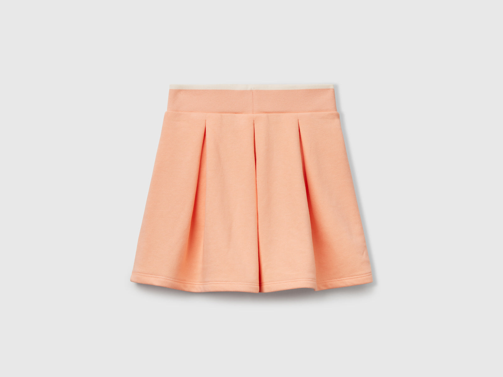 Gonna in felpa con pieghe da bambina pesca 2 | Benetton Outlet