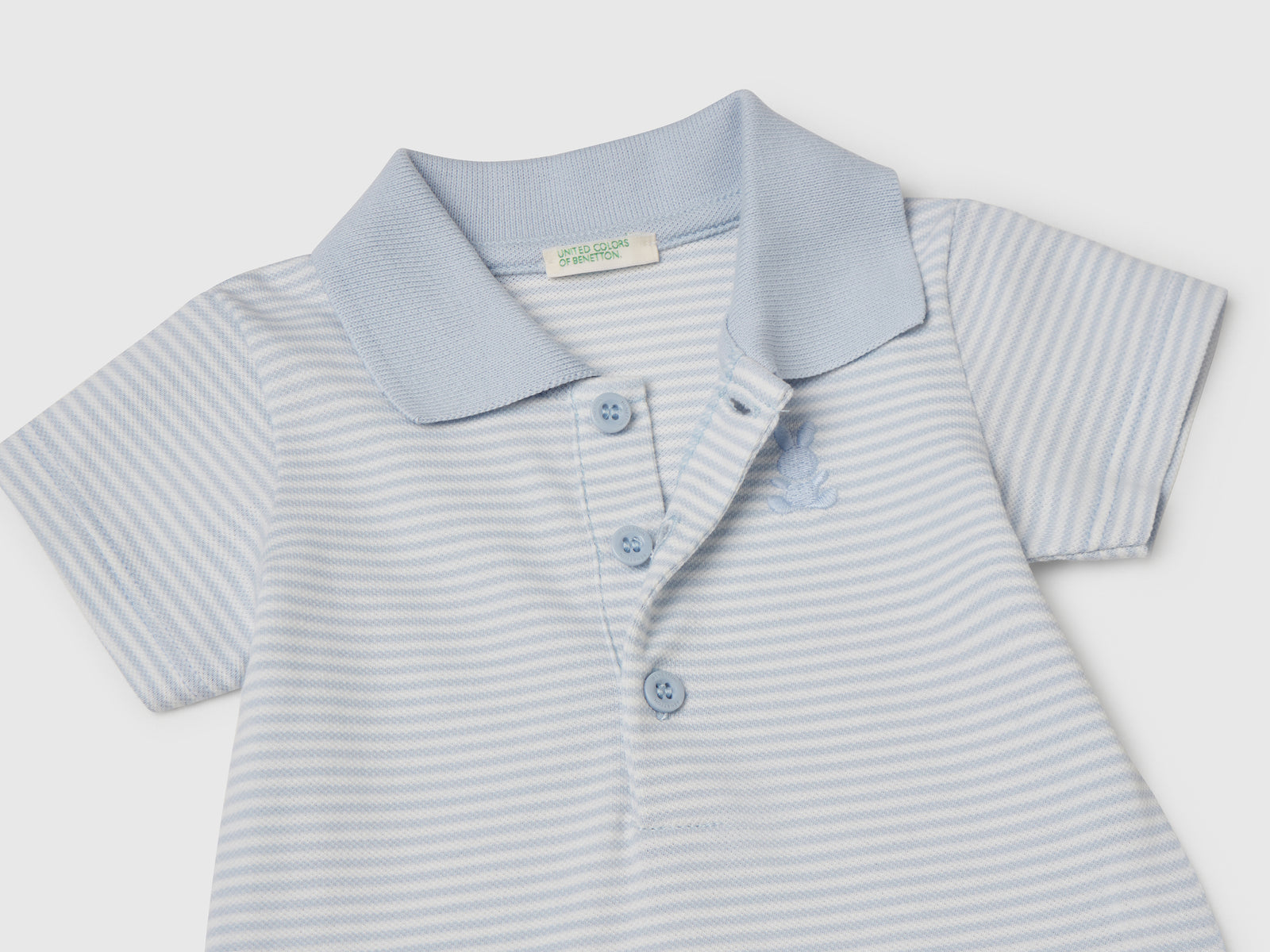 Body a polo in cotone elasticizzato da neonato celeste 3 | Benetton Outlet