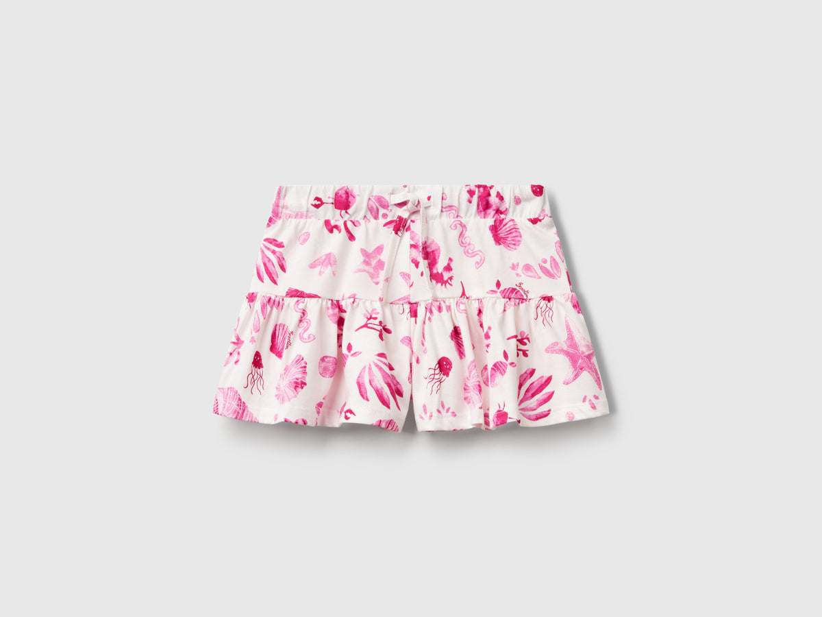 Shorts con conchiglie