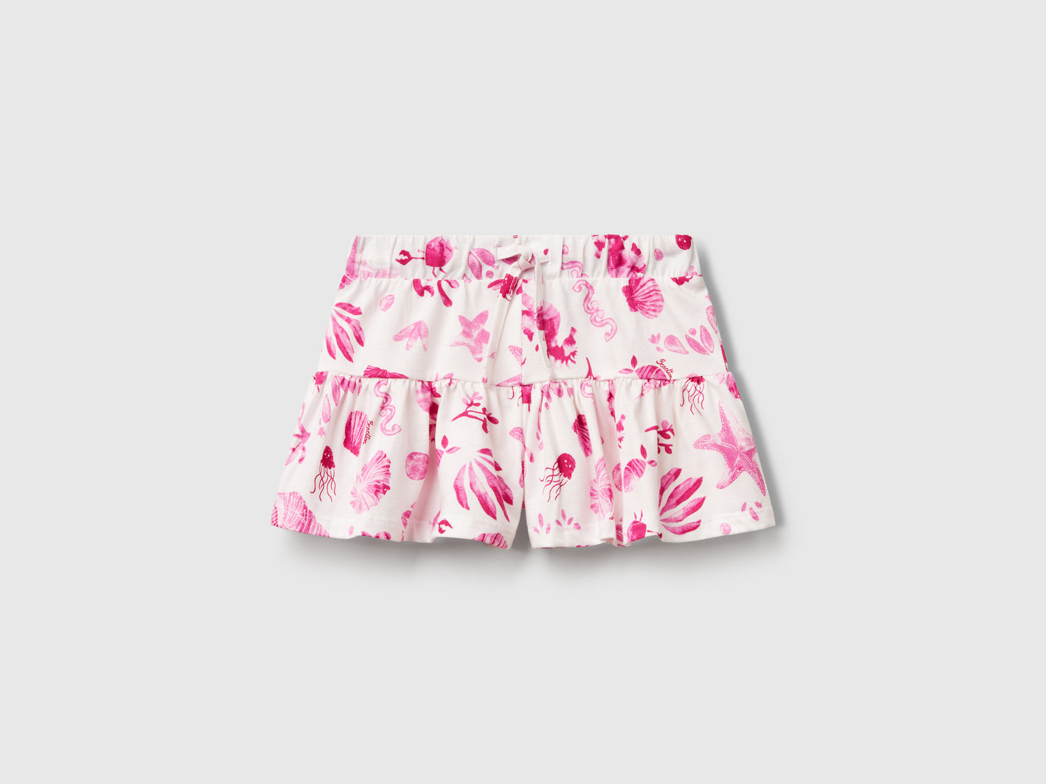 Shorts con conchiglie da bimba rosa | Benetton Outlet