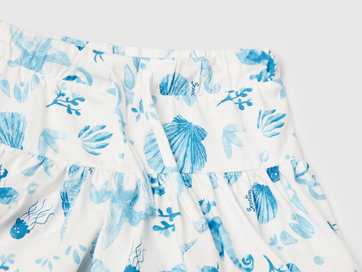 Shorts con conchiglie blu