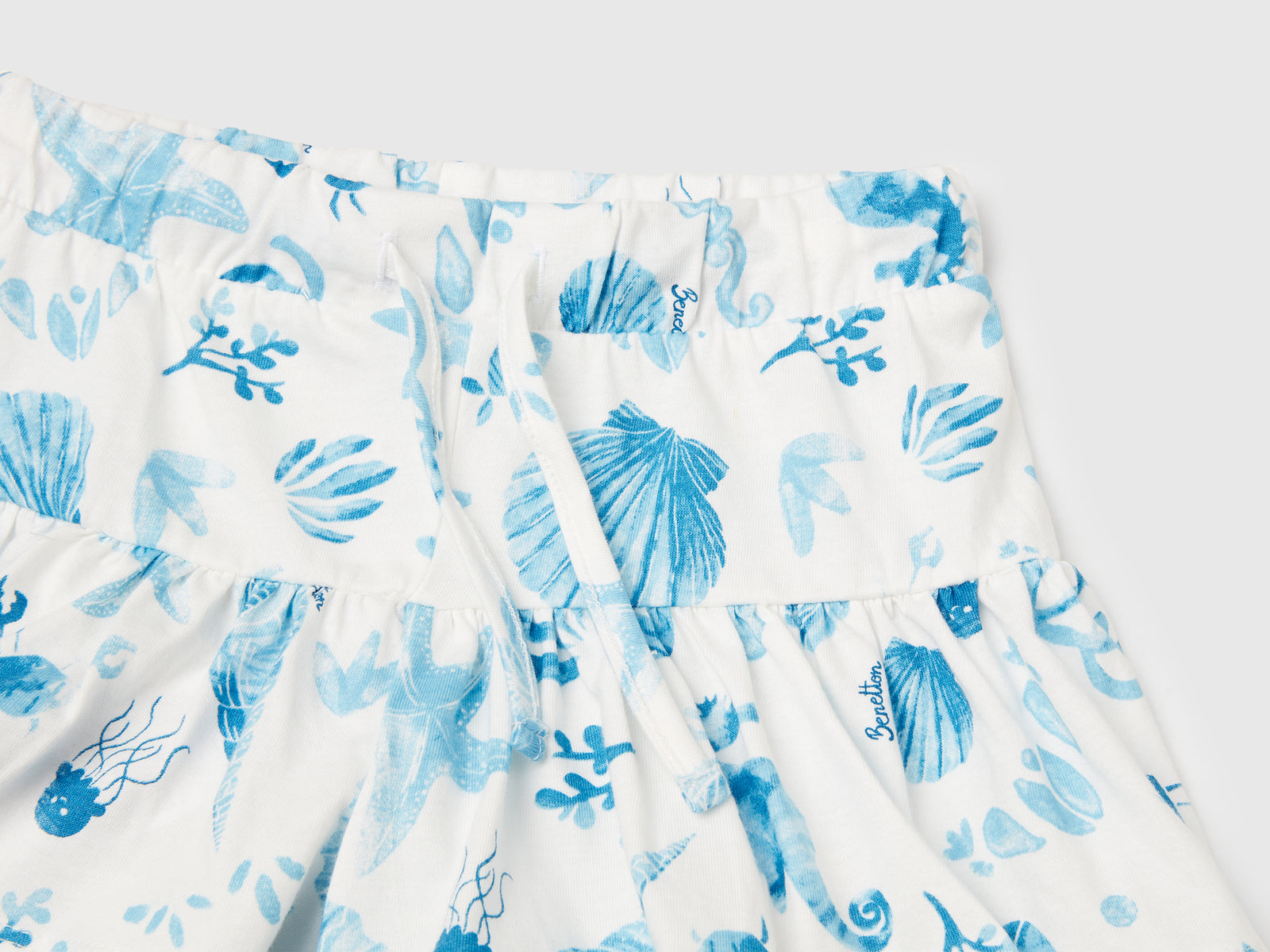 Shorts con conchiglie blu da bimba azzurro 3 | Benetton Outlet
