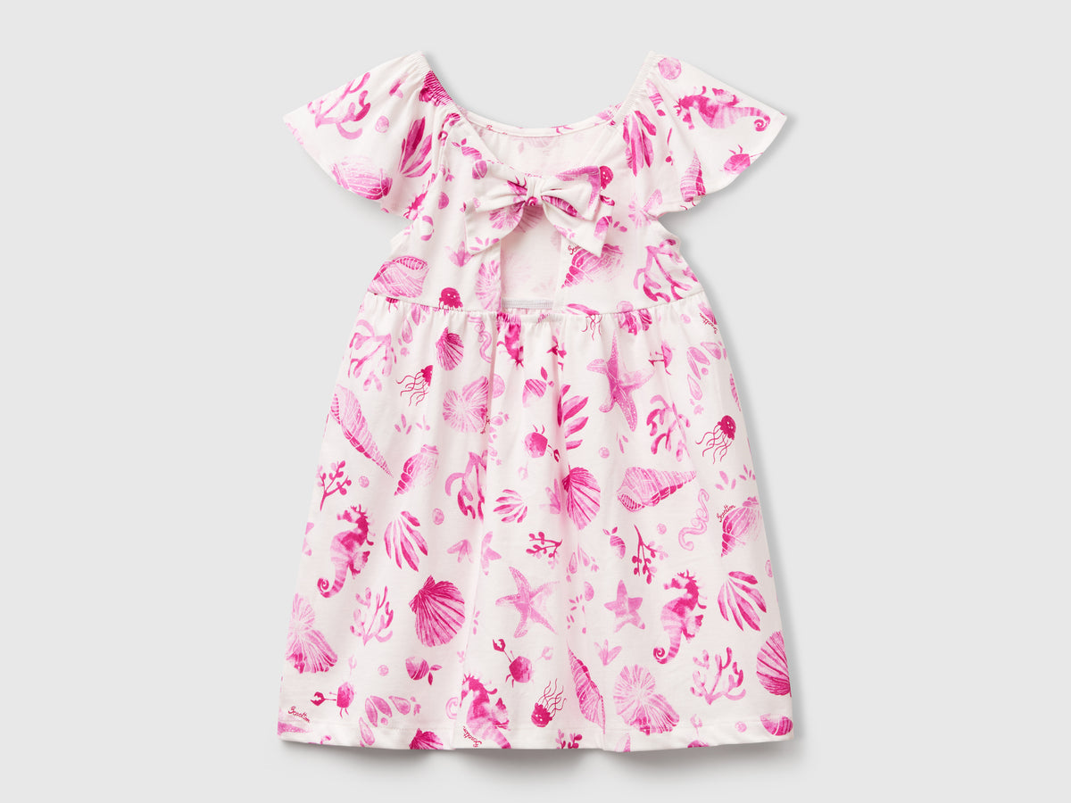 Vestito bianco con conchiglie