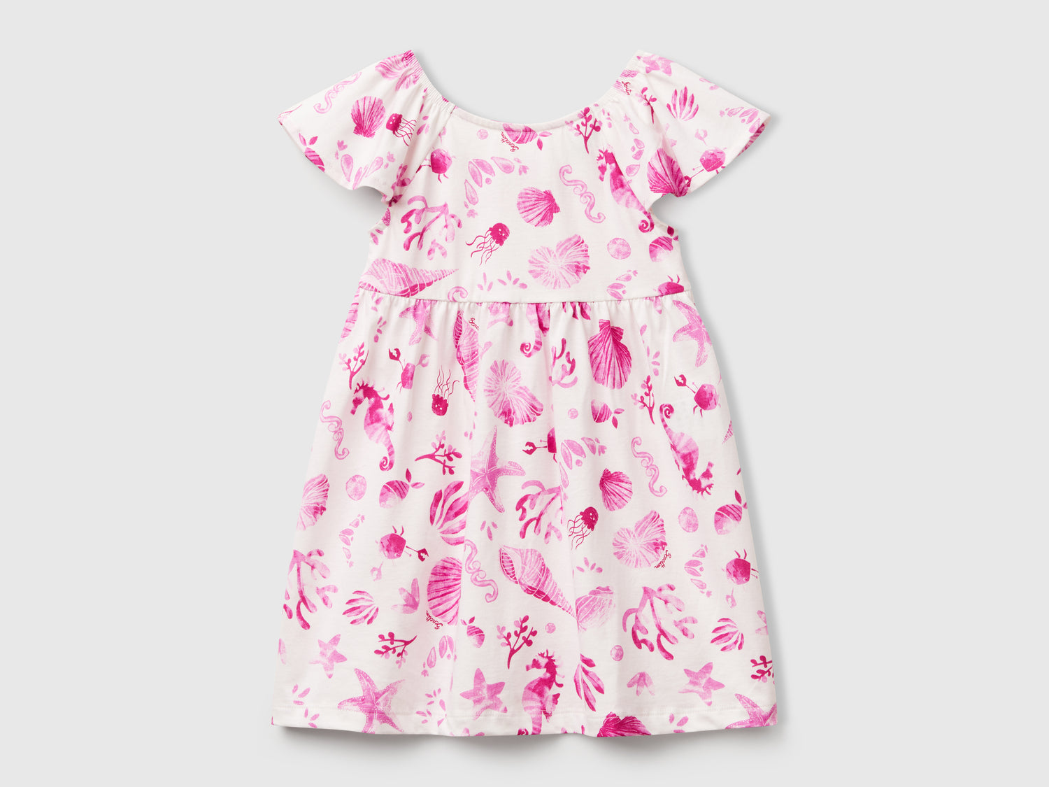 Vestito bianco con conchiglie da bimba rosa | Benetton Outlet
