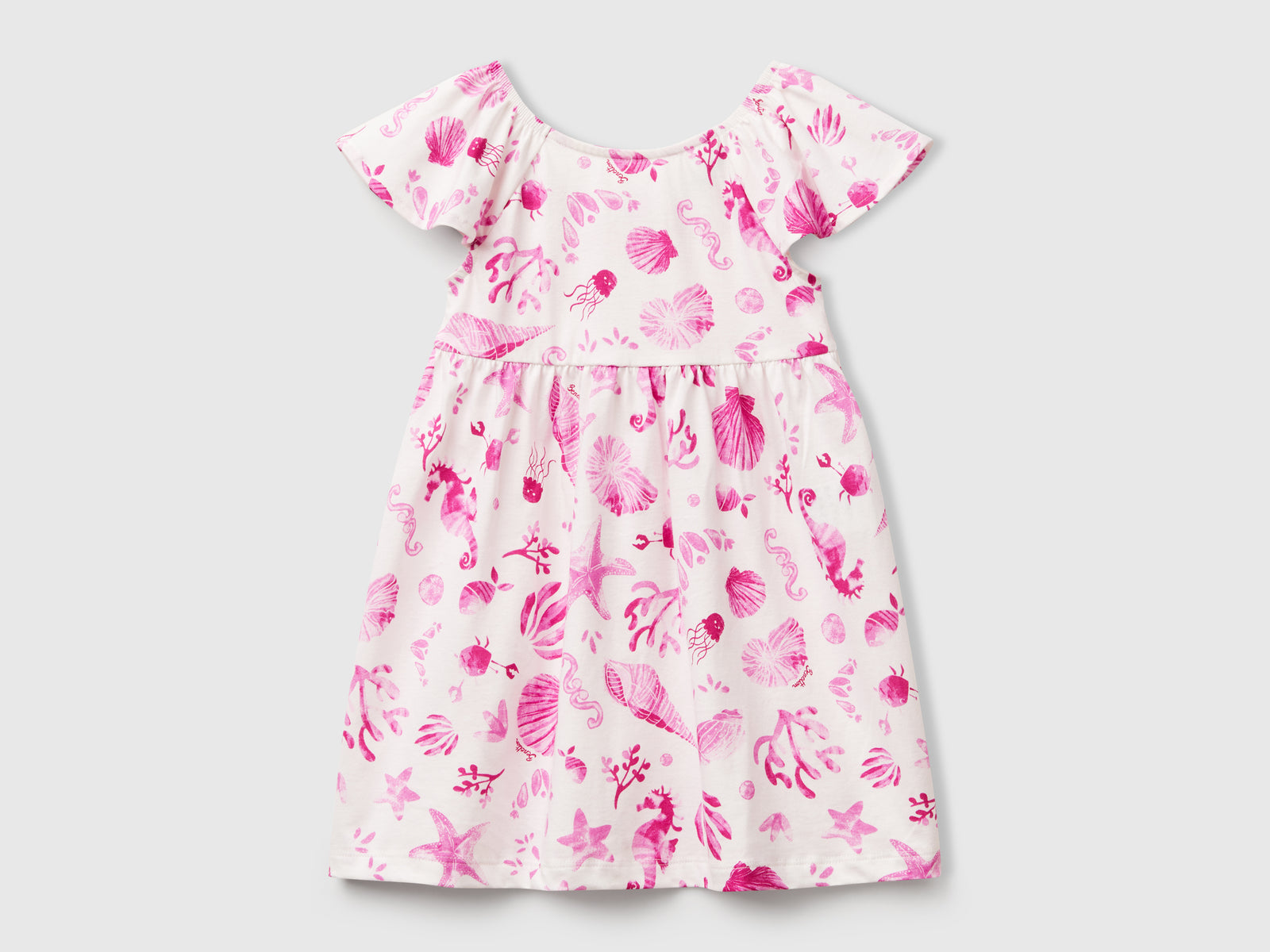 Vestito bianco con conchiglie da bimba rosa | Benetton Outlet
