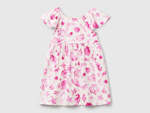 Vestito bianco con conchiglie