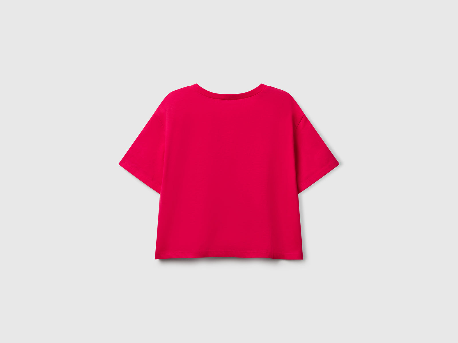 Maglietta con stampa glitterata da bambina fucsia 2 | Benetton Outlet