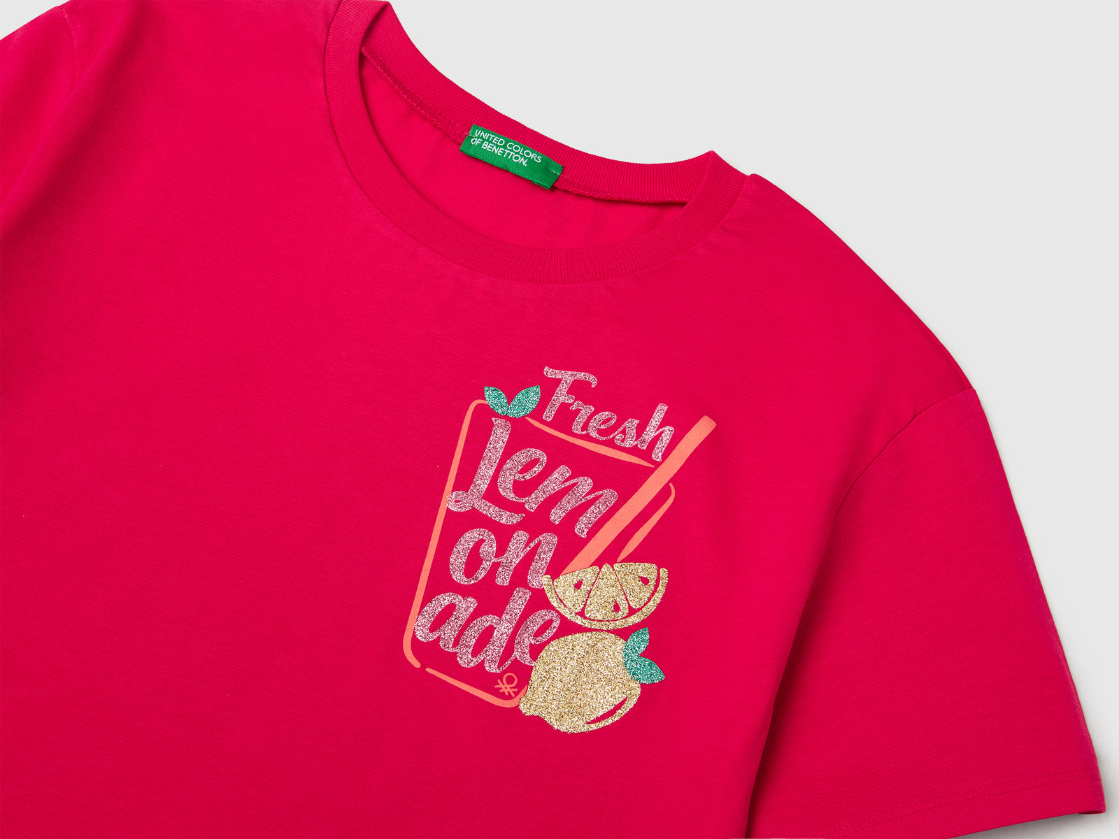 Maglietta con stampa glitterata da bambina fucsia 3 | Benetton Outlet