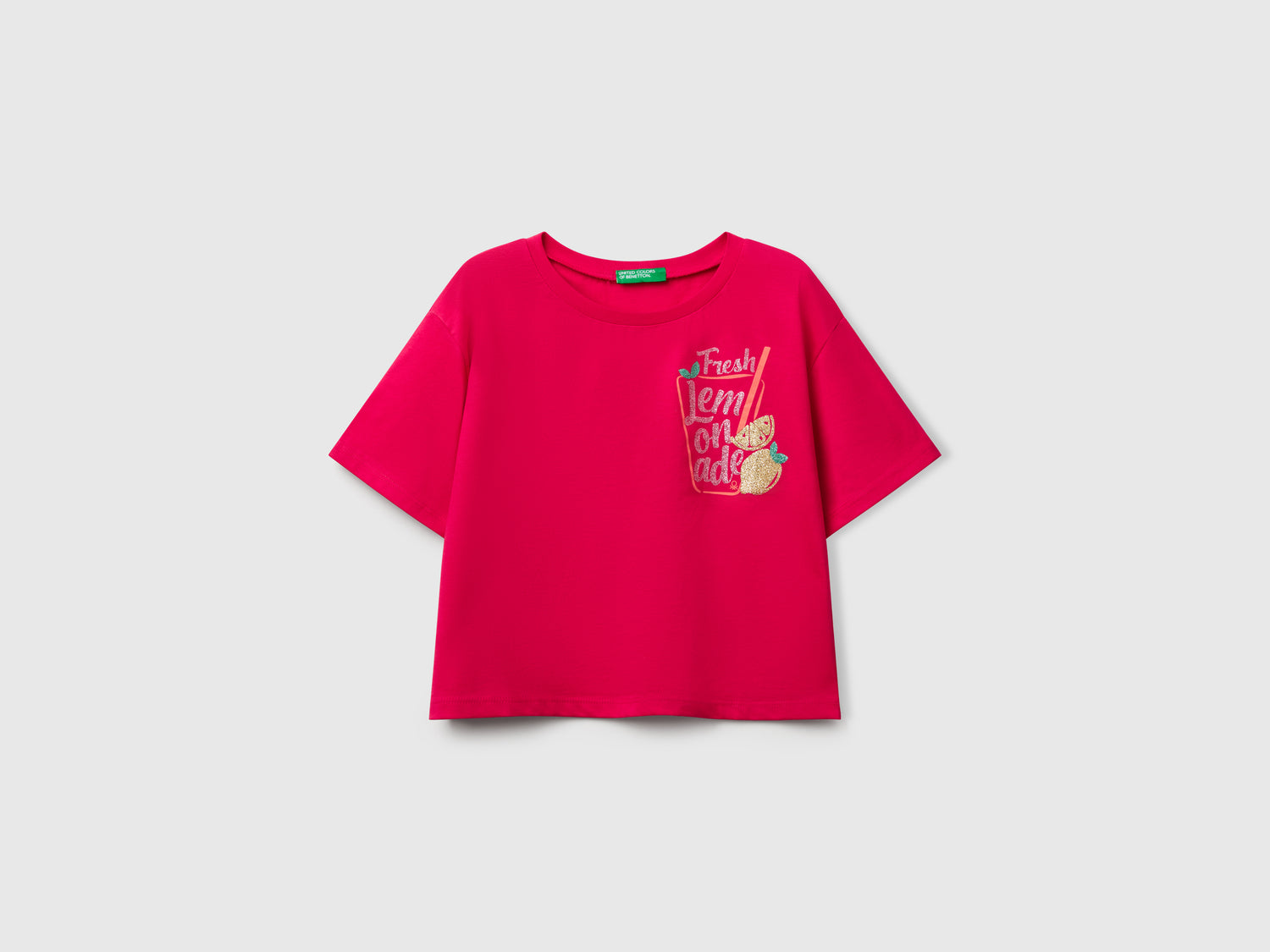 Maglietta con stampa glitterata da bambina fucsia | Benetton Outlet