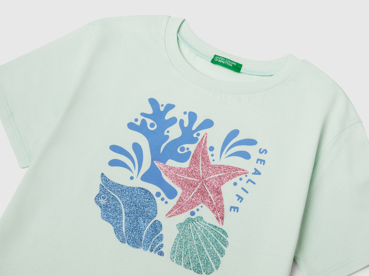 Maglietta con stampa glitterata
