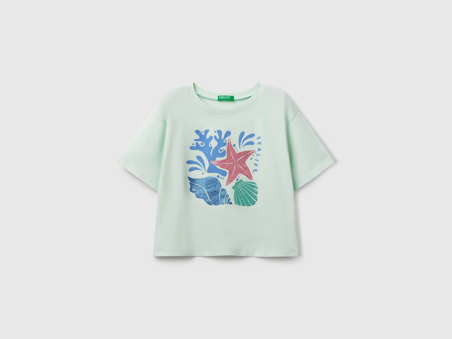 Maglietta con stampa glitterata da bambina verde acqua | Benetton Outlet