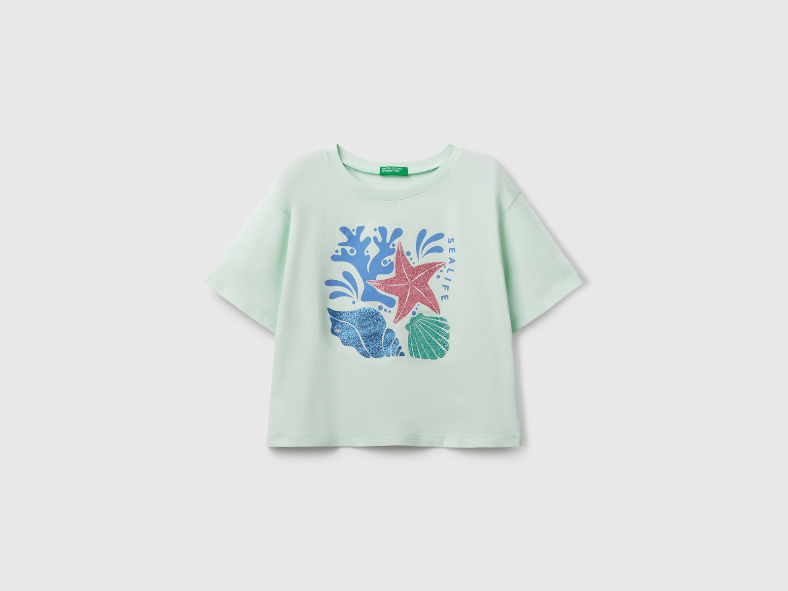 Maglietta con stampa glitterata da bambina verde acqua | Benetton Outlet