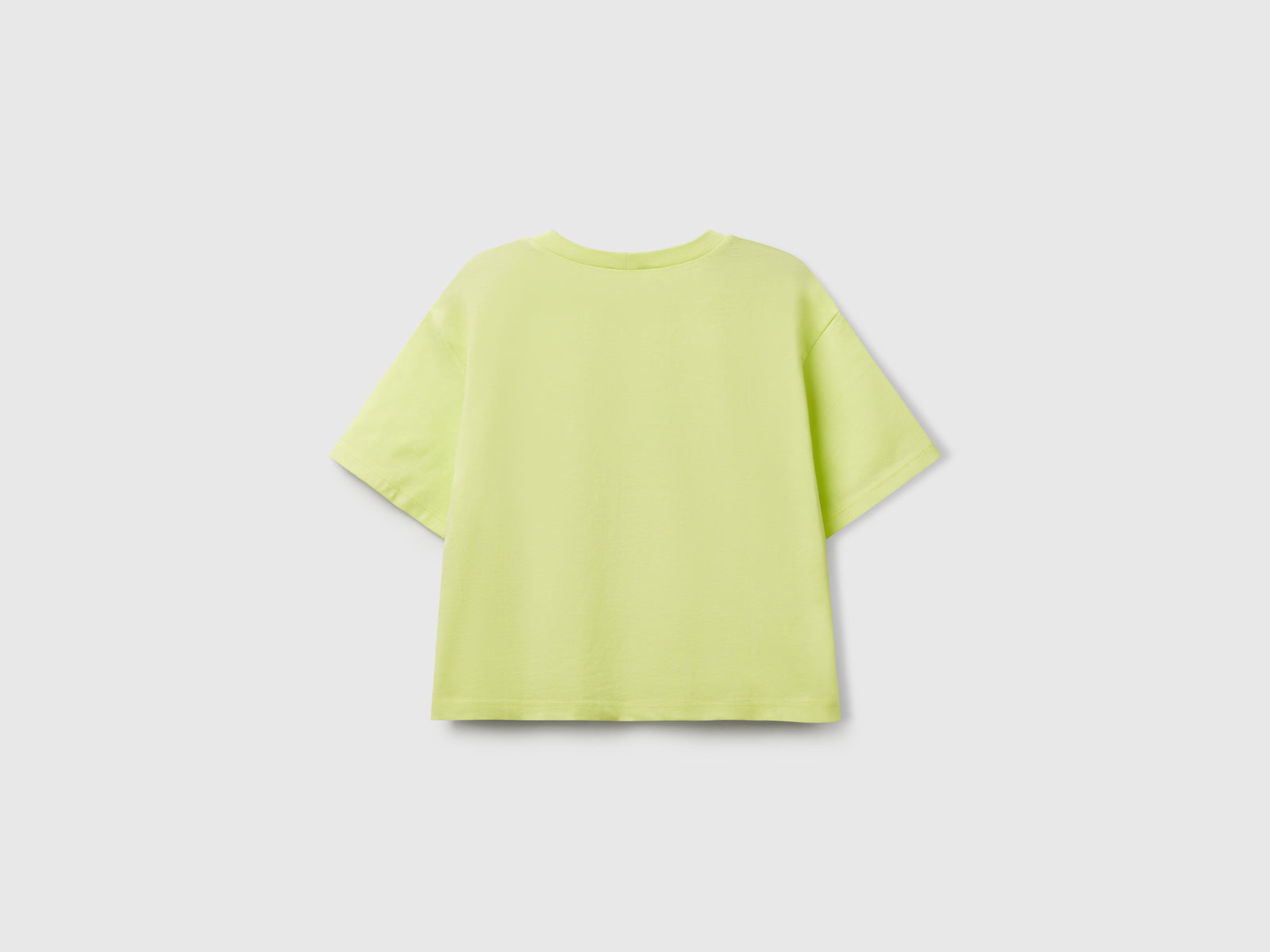 Maglietta con stampa glitterata da bambina lime 2 | Benetton Outlet