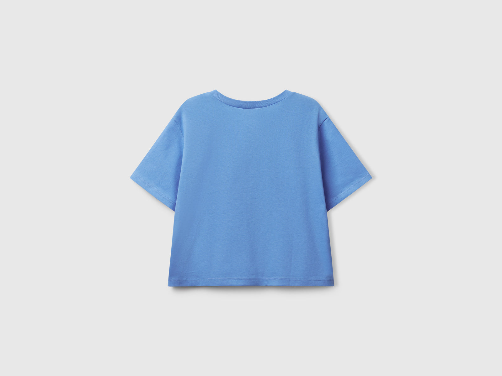 Maglietta con stampa glitterata da bambina celeste 2 | Benetton Outlet