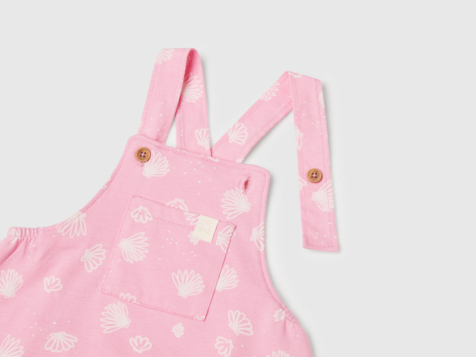 Salopette con fantasia floreale da neonato rosa 3 | Benetton Outlet