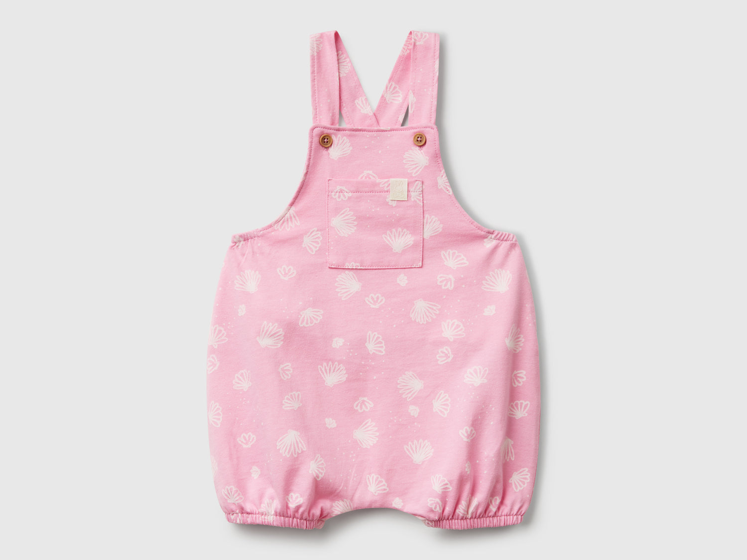 Salopette con fantasia floreale da neonato rosa | Benetton Outlet