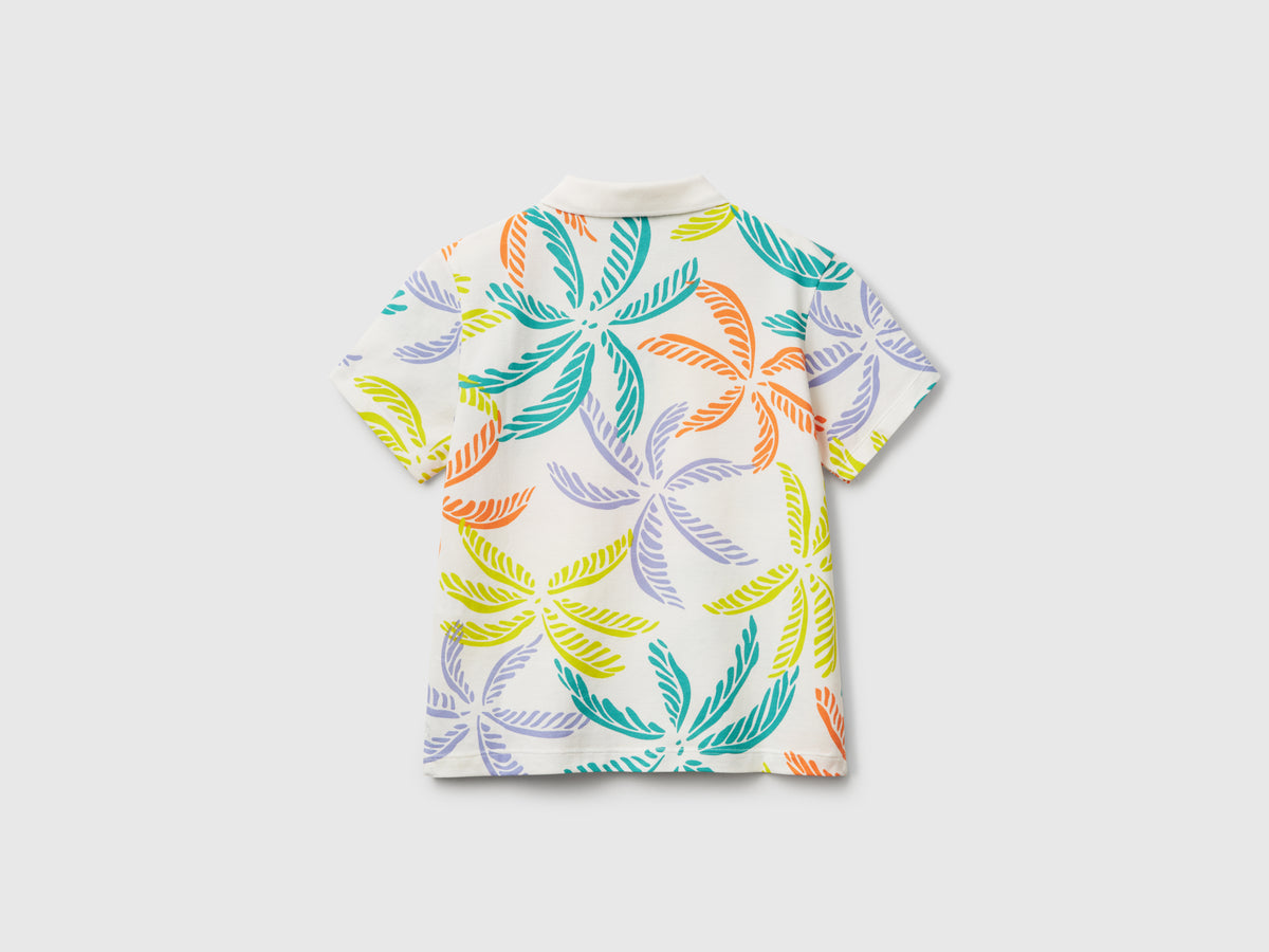 Polo con stampa tropicale
