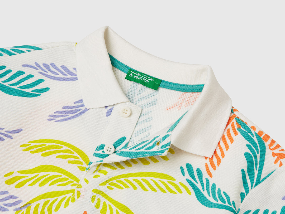 Polo con stampa tropicale