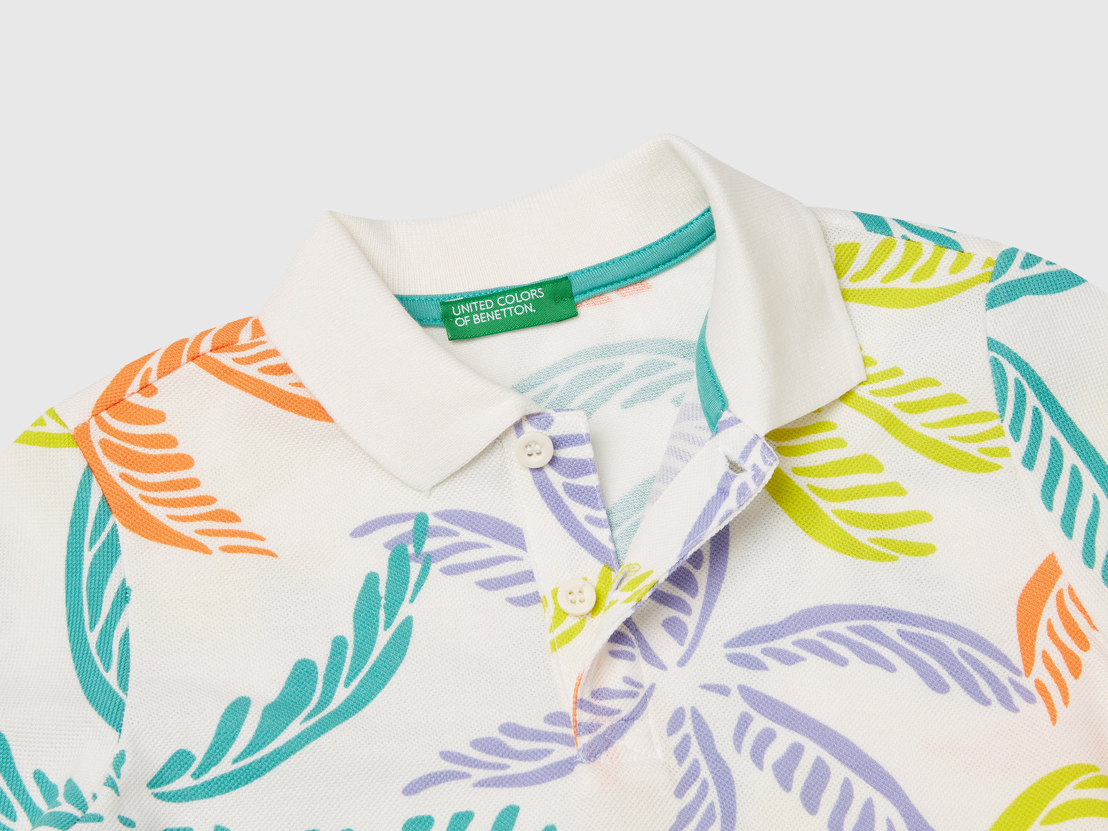 Polo con stampa tropicale da bimbo bianco 3 | Benetton Outlet