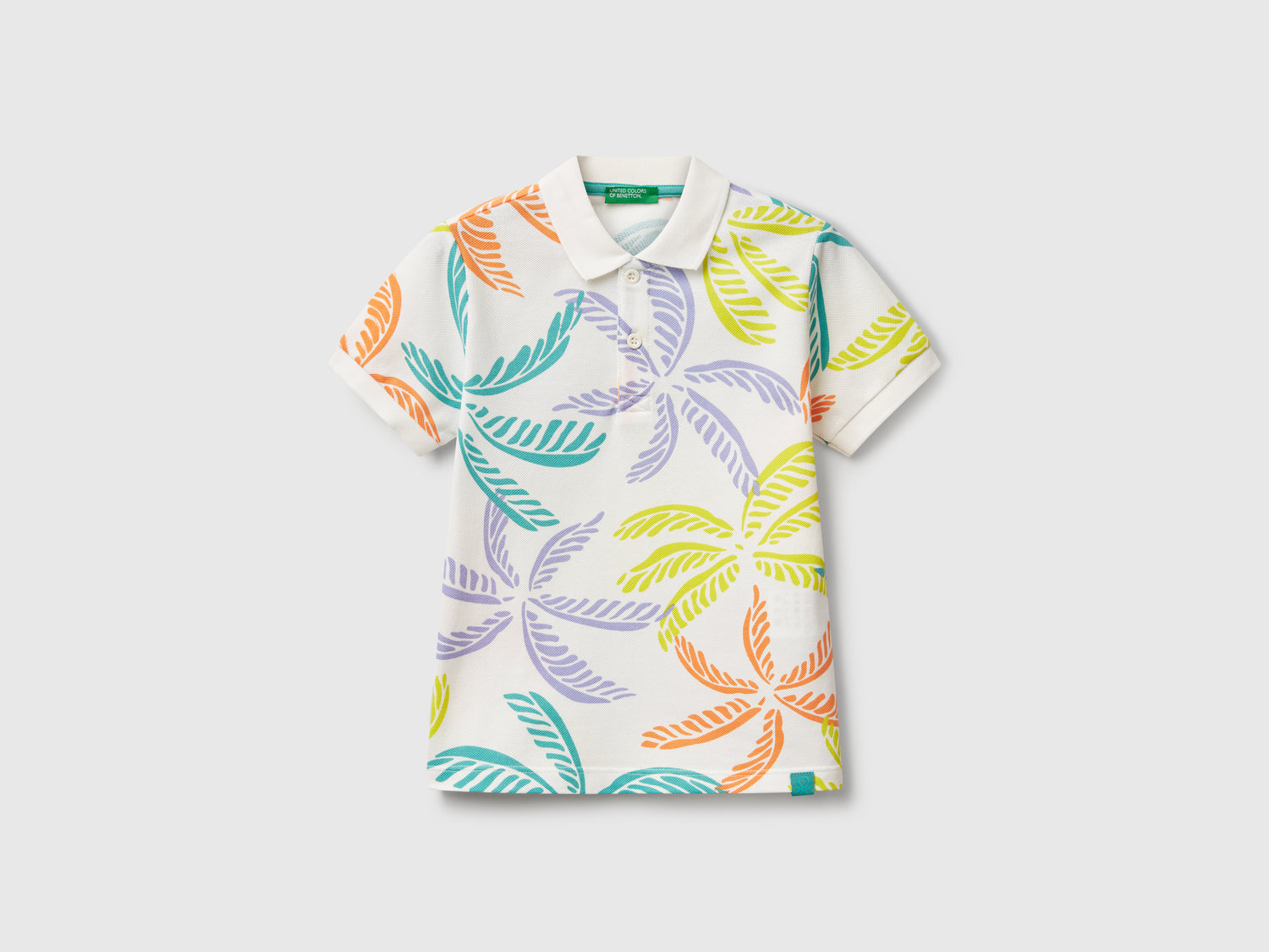 Polo con stampa tropicale da bimbo bianco | Benetton Outlet