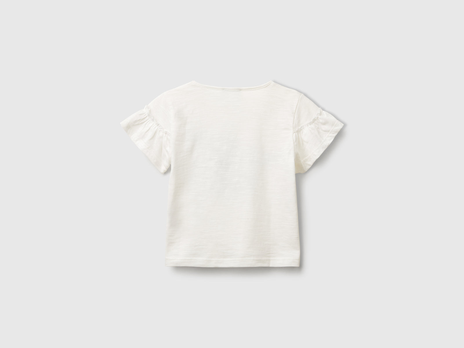 T-shirt con applicazione da bimba bianco panna 2 | Benetton Outlet