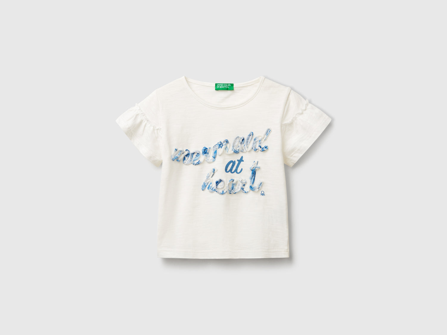 T-shirt con applicazione da bimba bianco panna | Benetton Outlet
